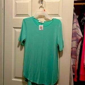 Turquoise Tee! Stretchy and soft spandex blend. Shows off your shape!